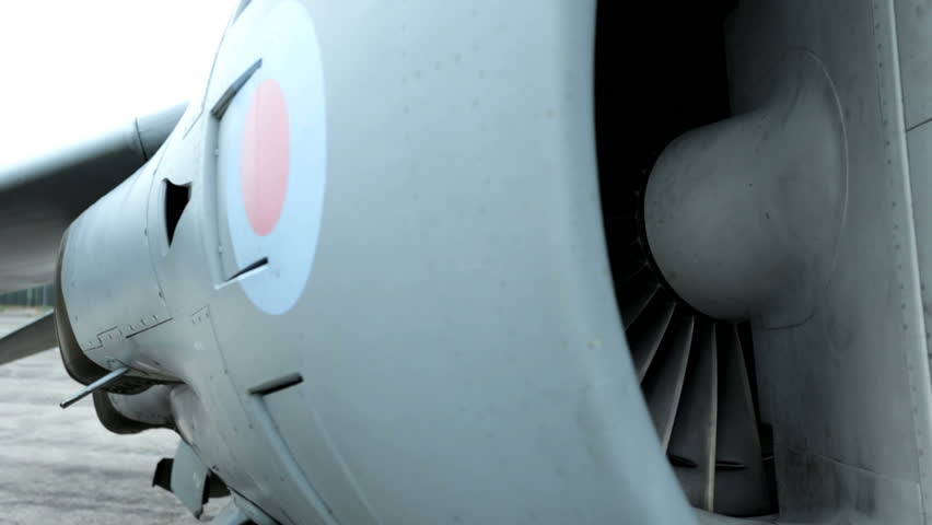 Dolly across the jet intake on a parked Harrier Jump Jet.