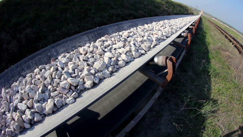 Fisheye of a long conveyor belt transporting stones to the manufacturing plant about 5 miles away.
