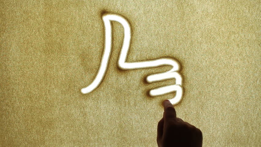 Thumbs up, drawn by a finger on sand, Sand Painting 