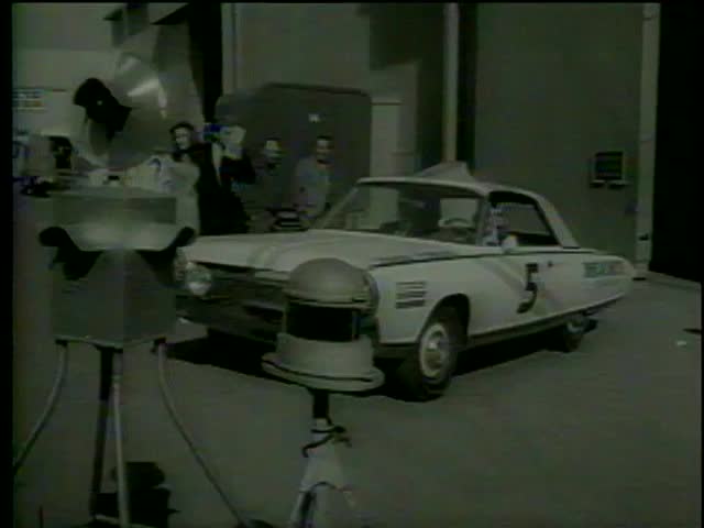 Marilyn Maxwell drives Chrysler turbine engined car at the set of movie "The Lively Set" in Universal City, CA circa 1964-MGM PICTURES, UNIVERSAL-INTERNATIONAL NEWSREEL, USA, filmed in 1964