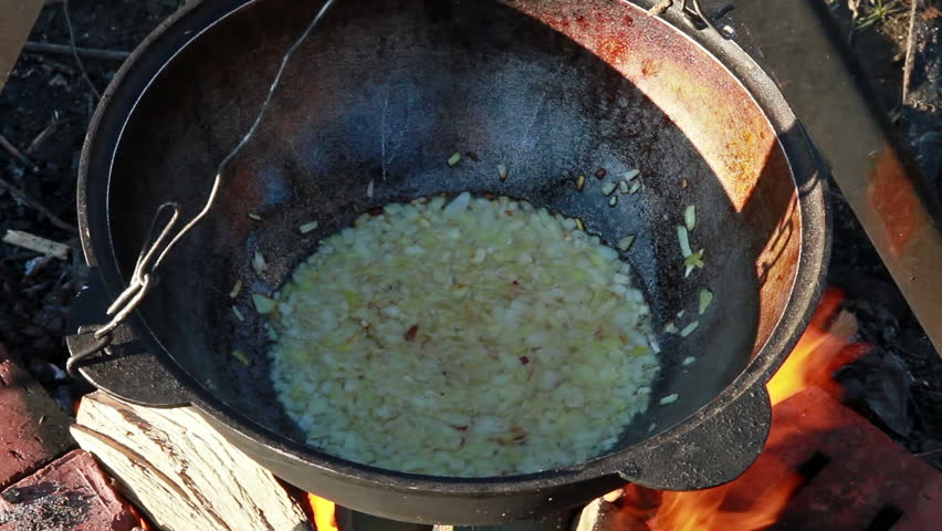 Cooking pilaf. Fold meat