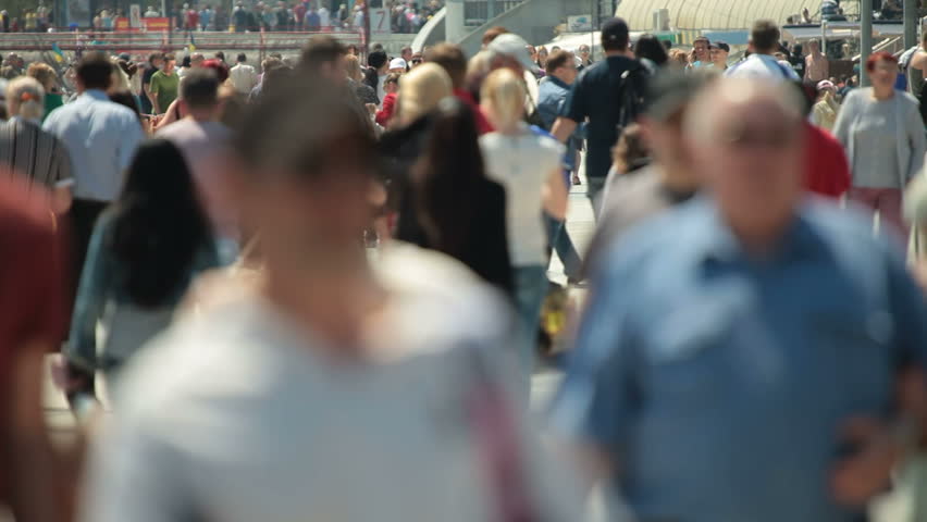 Walking Crowd On The Sea Promenade