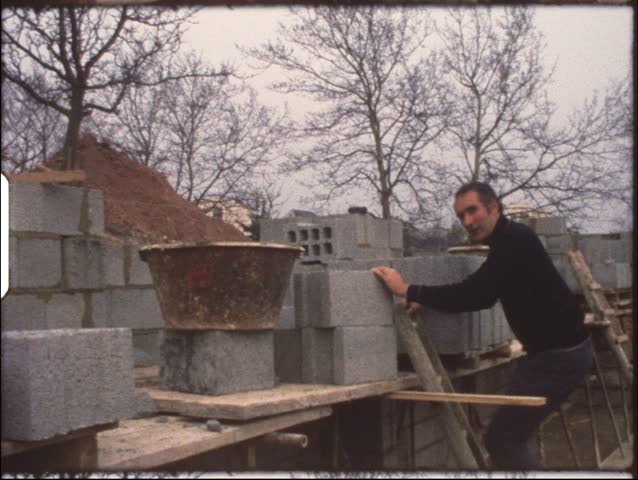 Vintage 8mm film: Housebuilding, Father laying bricks