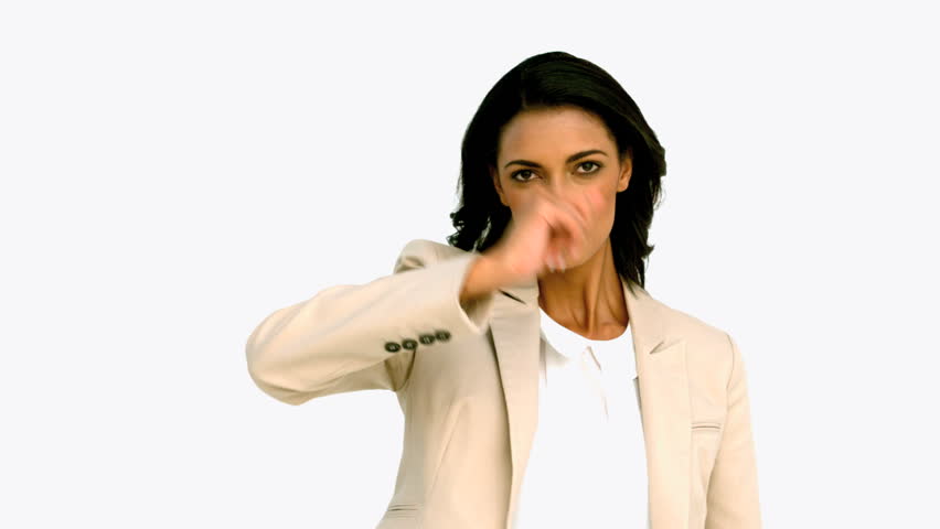 Businesswoman snapping her fingers and holding hand out on slow motion
