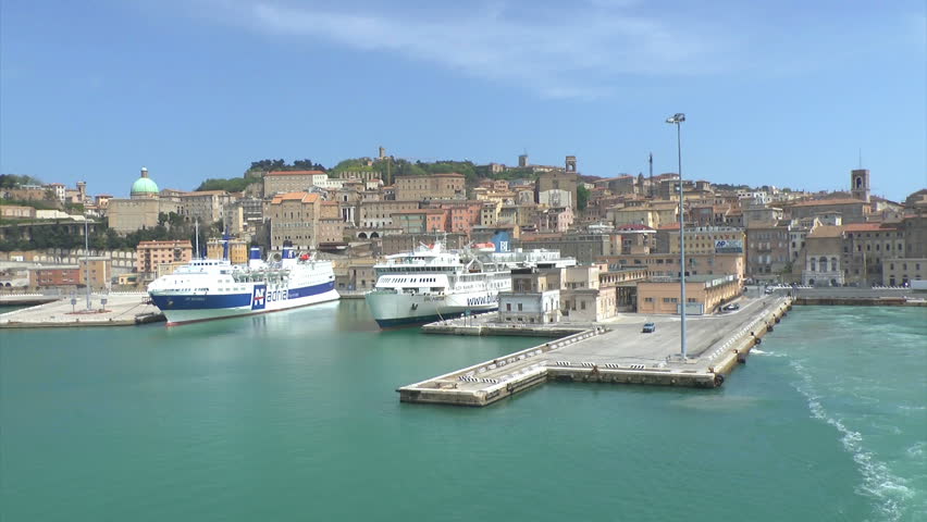 Footage of the view from a Ferry leaving it's berth in a port