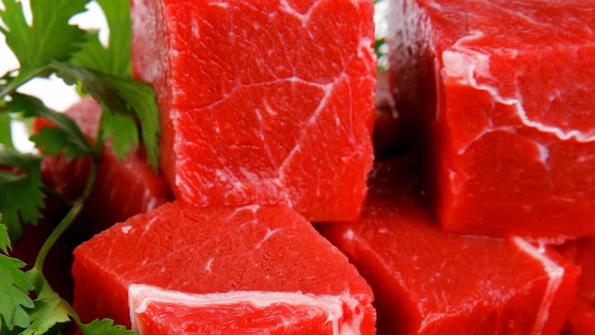 slices of raw fresh beef meat fillet in a ceramic dish with onions and peppers 1920x1080 intro motion slow hidef hd