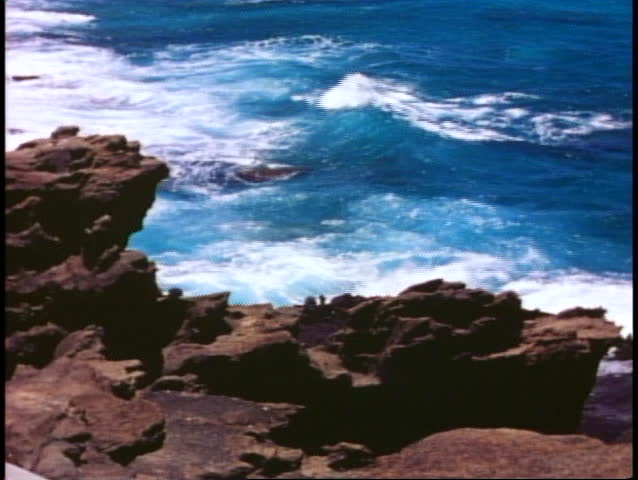 Hawaii, Island of Oahu cliffs and sea, rugged and jagged, medium shot