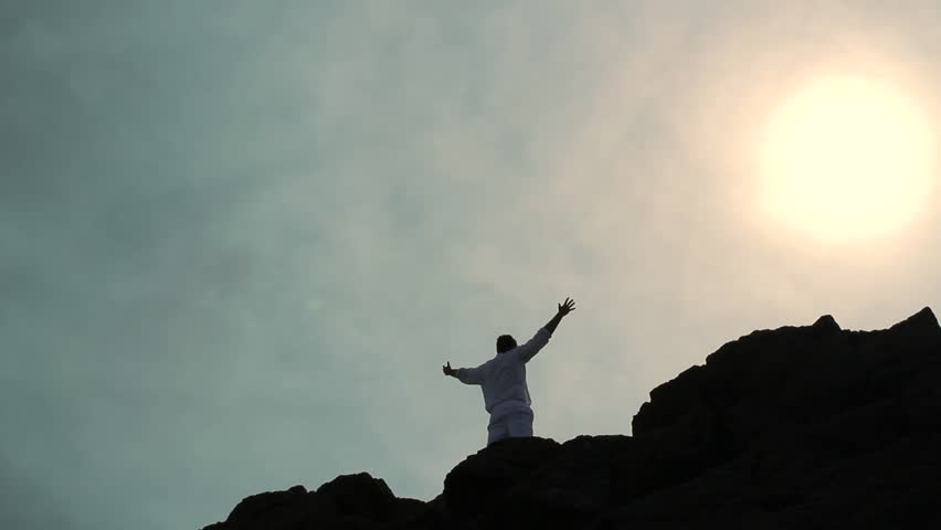 Climber Reaching Top of a Mountain Raising Hands Success Concept Background HD