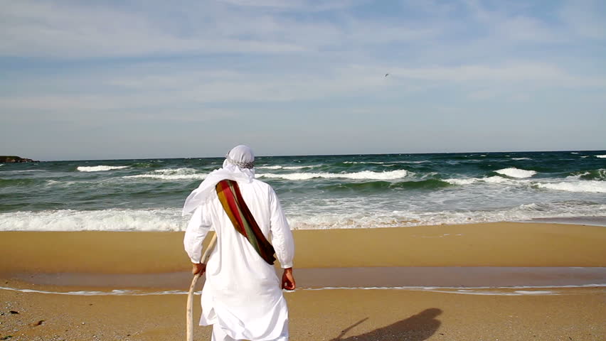 Prophet Reaching the Ocean and Raising Hands in Prayer Religious Concept HD