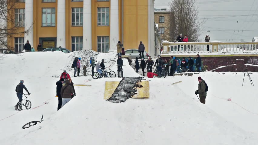 PETROZAVODSK, RUSSIA - FEBRUARY ,16: Biker making jumping tricks during Hyperborea festival on February 16, 2013 in Petrozavodsk, Russia. Event was free for watching and participating, bkers anonimous