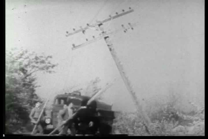 1940s - Archival black and white film describing how the nation's telephone system was rebuilt following natural disasters in the 1930s