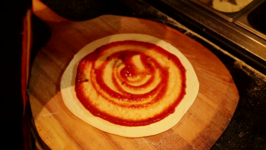 Preparing pizza with vegetables