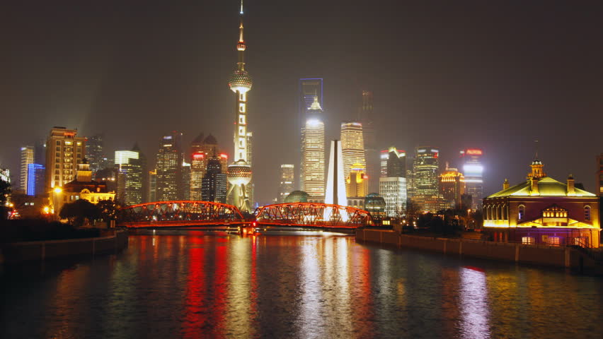 Time lapse of Shanghai Garden Bridge skyline at night - view from suzhou river, Shanghai , China.