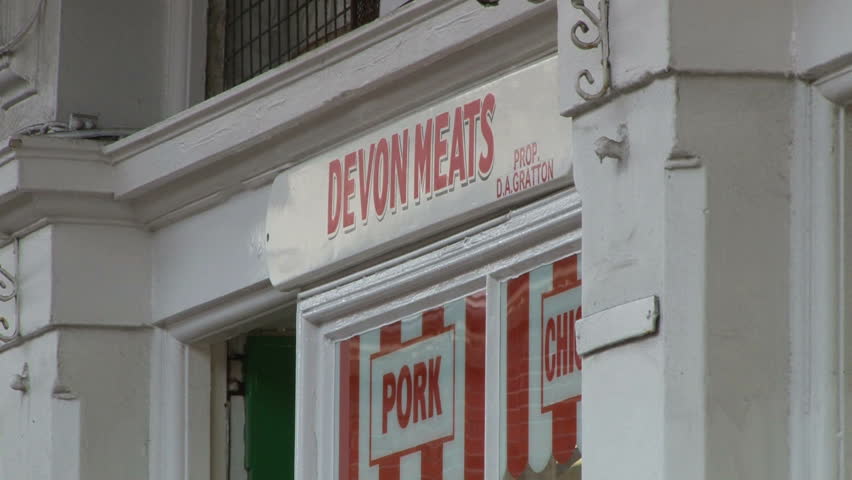 BIDEFORD, UK - SEPTEMBER 2012 - A busy row of butchers stalls and shops on Butcher's Row in Barnstaple.