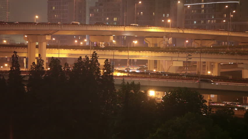 shot of cars at night in an urban landscape