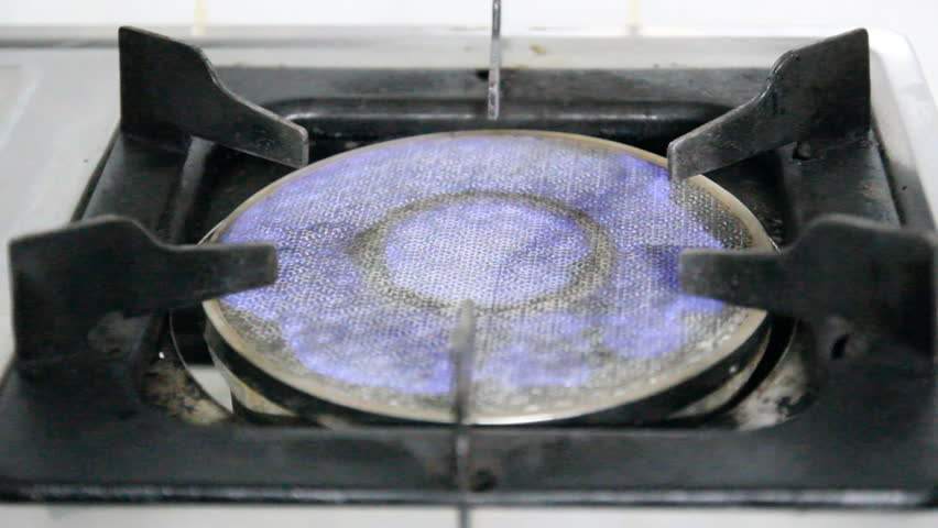 Blue fire of Gas stove in kitchen