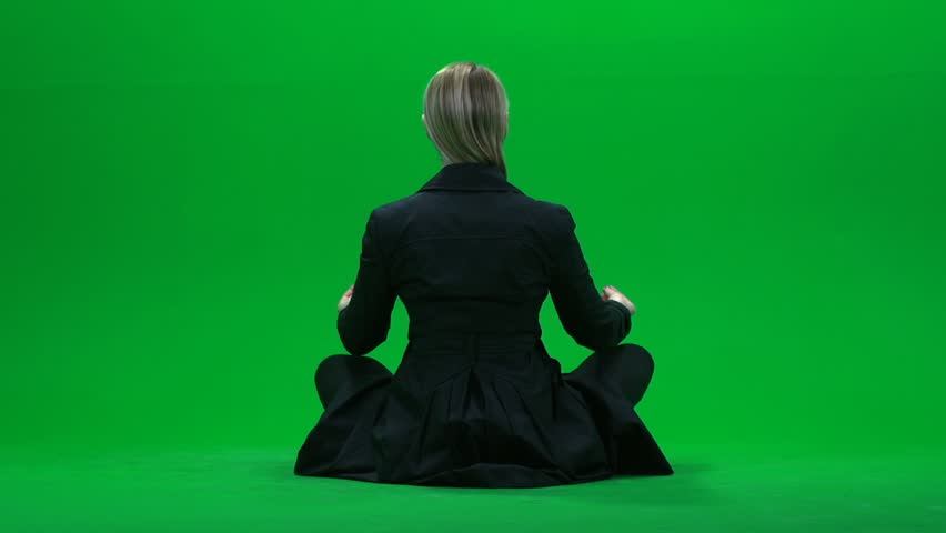 women doing yoga against green screen