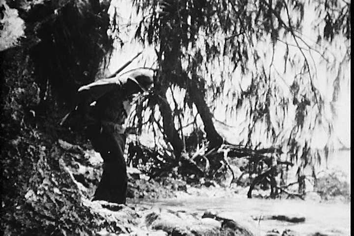 1940s - Amphibious invasion of beaches of a South pacific Island during World War Two.