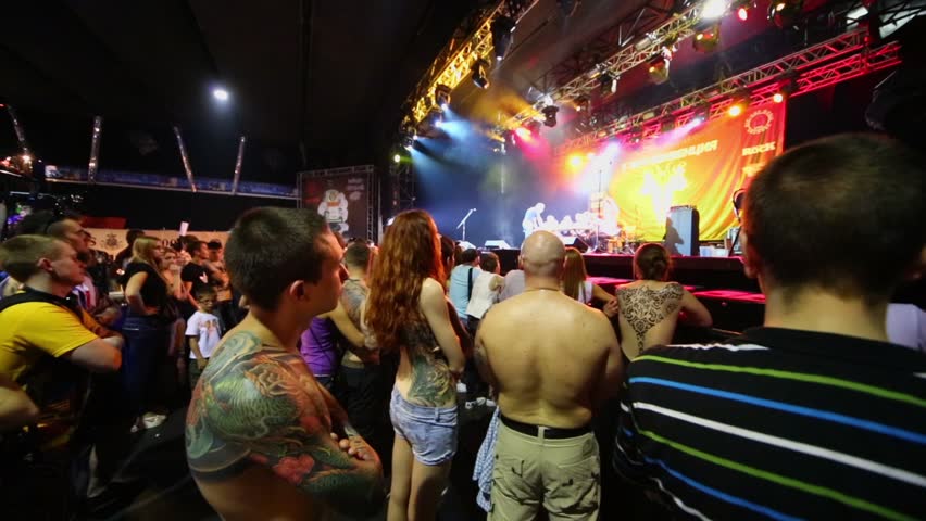 MOSCOW - MAY 20: Crowd watch jury on stage of club ARENA during Moscow International Tattoo Convention V on May 20, 2012, Moscow, Russia. Convention was organized by Tattoo Studio Angel.