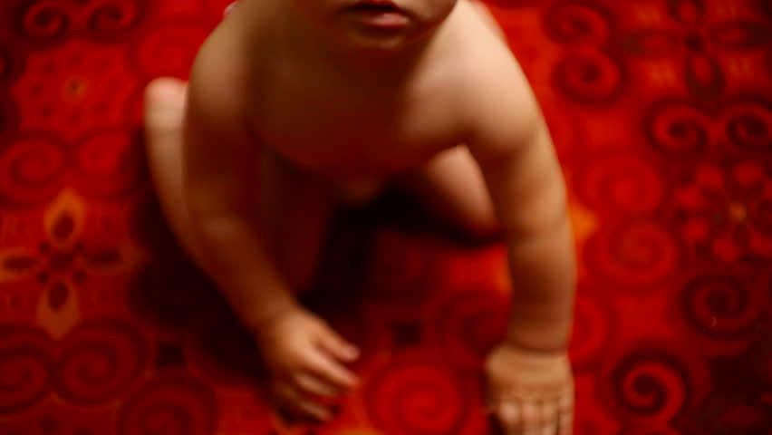 small child reaches for her mother