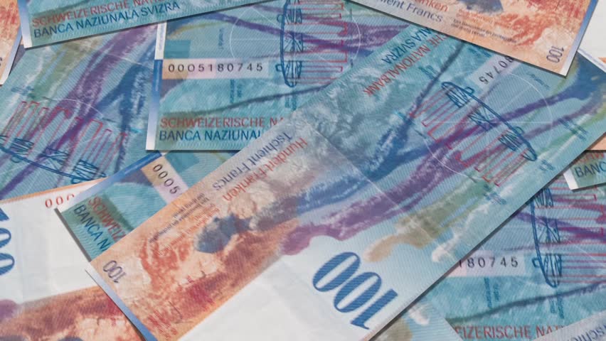 Swiss currency of 100 francs, fly over banknotes of 100, Swiss  Money and bank notes in Switzerland