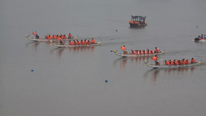 LUANNAN - JUNE 15: The dragon boat race scene in Chinese traditional Dragon Boat Festival on June 15, 2013, Luannan, Hebei Province, China.
