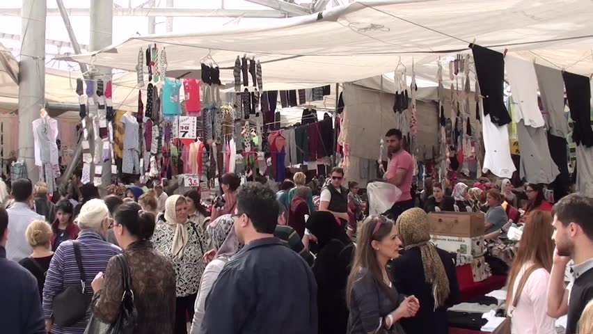 PENDIK, ISTANBUL, TURKEY â April 6, 2013: Horde of people at the merchandise market, audio