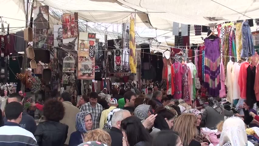 PENDIK, ISTANBUL, TURKEY â April 6, 2013: Horde of people at the merchandise market, audio