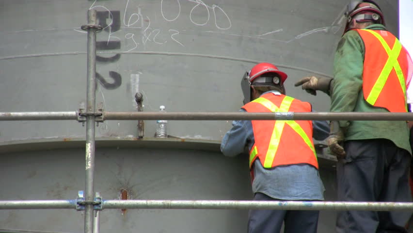 construction crew working on stack