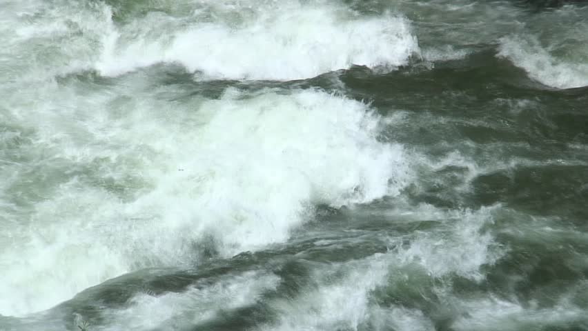 1080i, not rendered: Two kayaks in the rapids of a mountain river.Tripod. Sound.