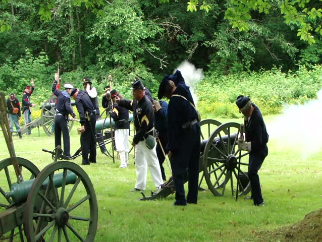 PORT GAMBLE, WA - JUN 20: Civil War reenactors participate in a mock battle as an artillery unit on June 20, 2009 in Port Gamble, WA.