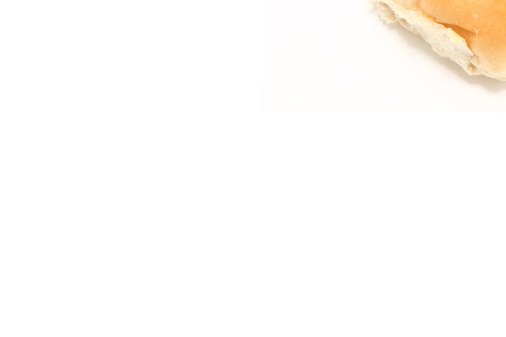 Hamburger bun broken into bites and reconnected.
