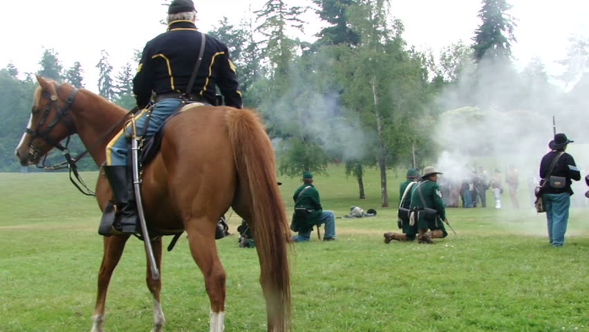 PORT GAMBLE, WA - JUN 20 - 	Union and Confederate infantry lines trade fire 	in a mock battle at Port Gamble WA on Jun 20, 2009. 