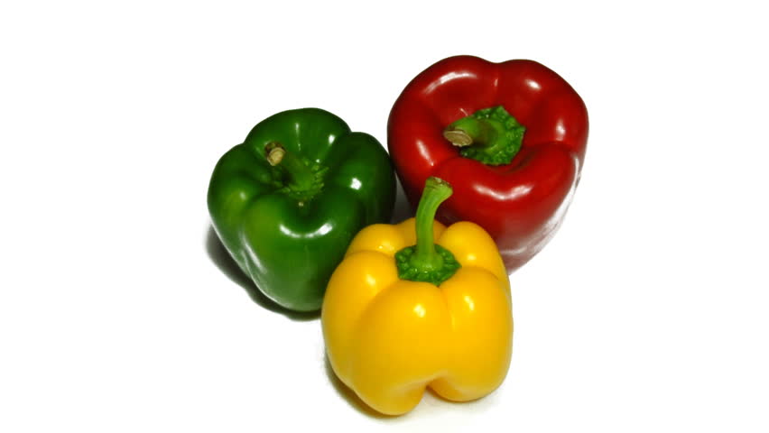 real 3D rotating three peppers isolated on white