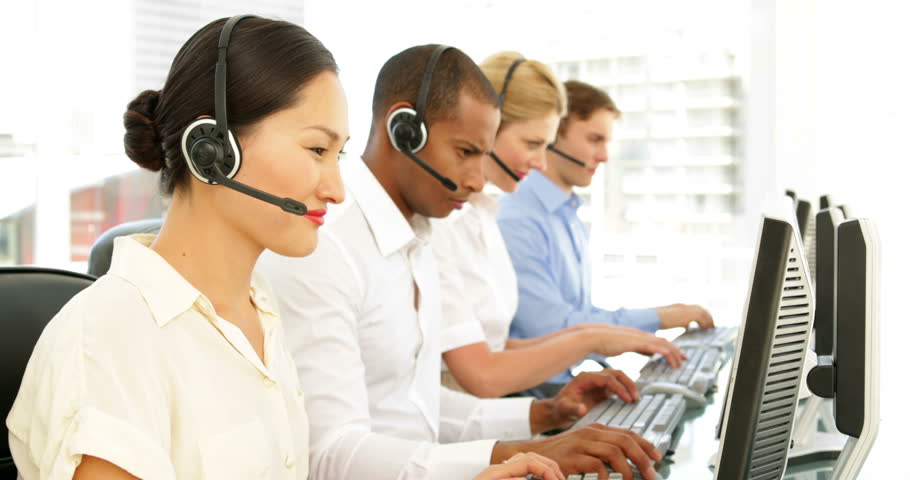 Call centre employees working at the office
