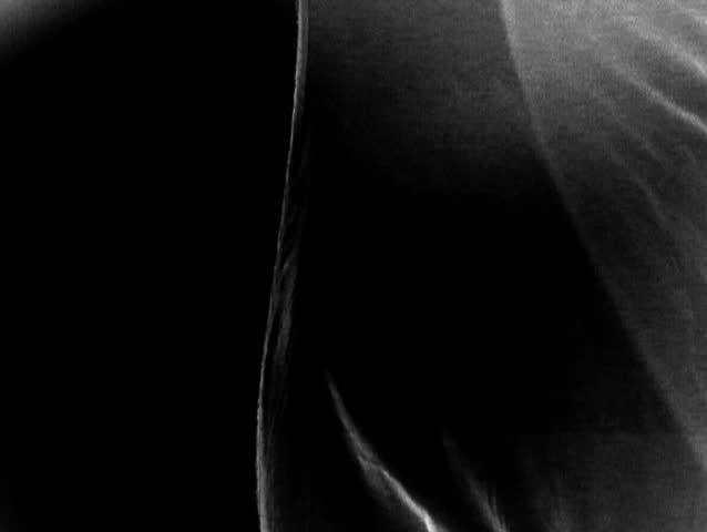 Black and White - flowing fabric sways from side to side.