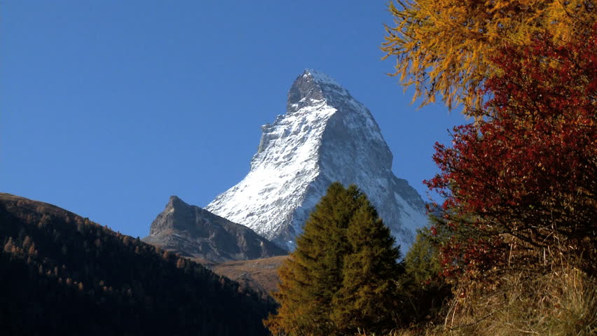 Fall in an alpine meadow, Zermatt, with Matterhorn in close-up, motion jib