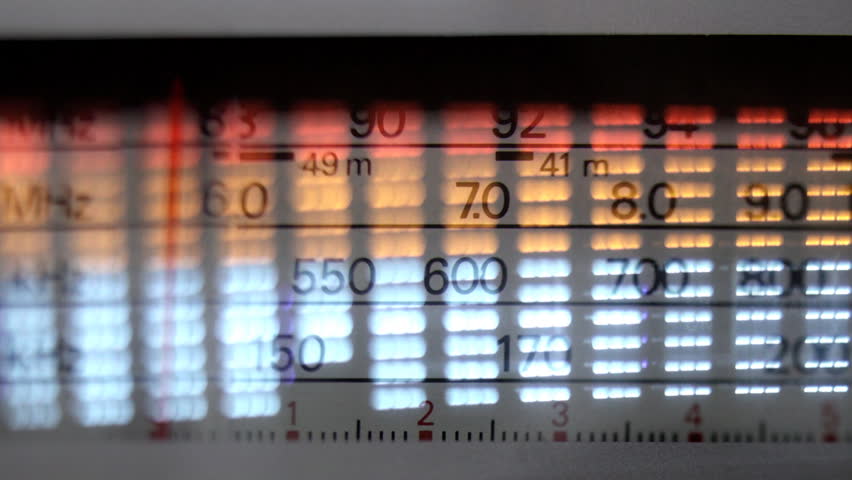 an analogue radio dial being tuned