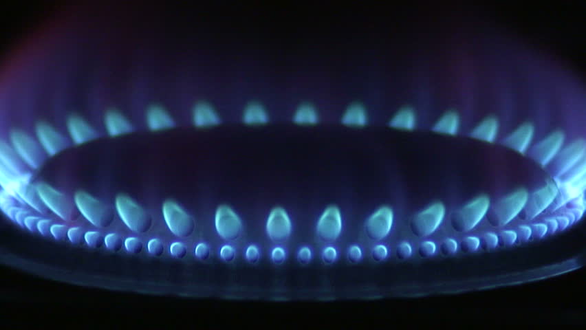 HD 1080i: Match lightening a burner of a gas stove.