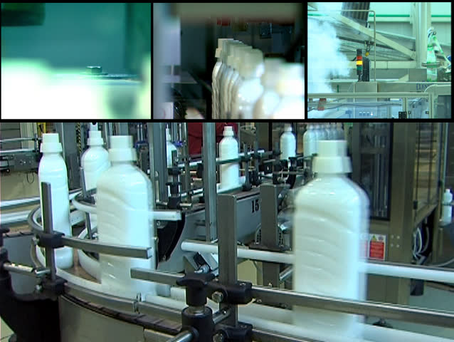 Industrial production of liquid detergent.Plastic bottles moving on a conveyor belt - Montage
