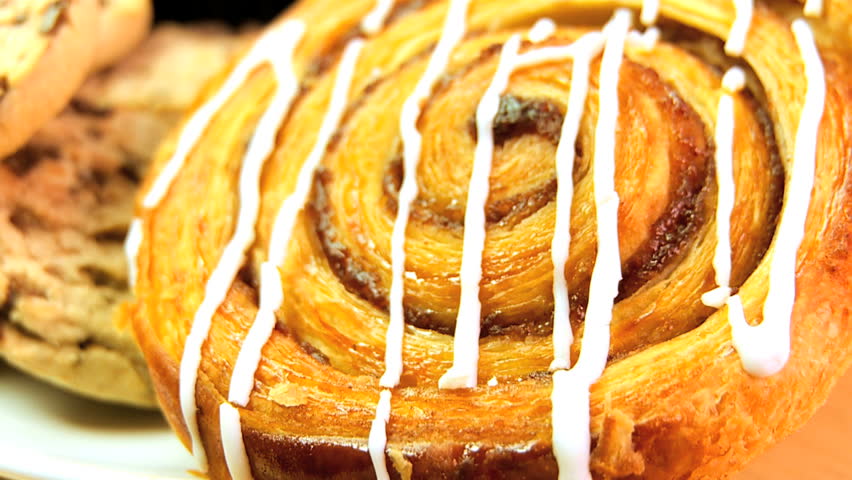 Tempting selection of indulgent high calorie sweet cookies, doughnuts & pastries