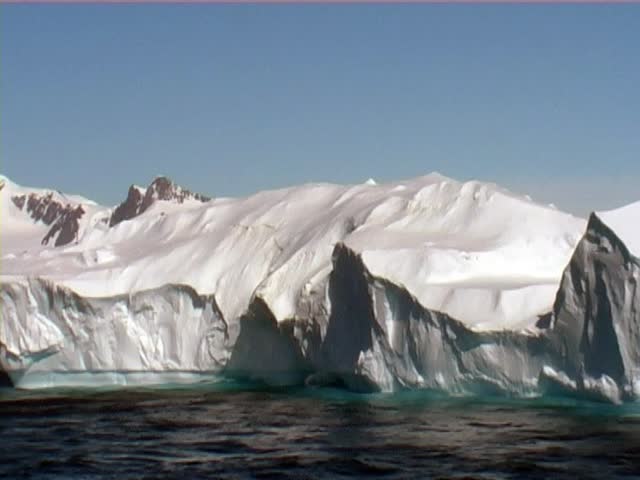 Beautiful iceberg at Antarctica on a clear sunny day. Taken from a passenger cruise ship.