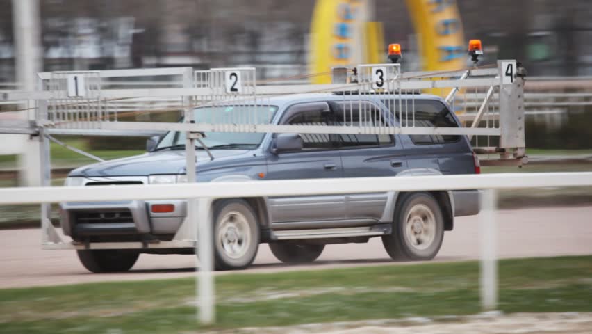 off-road car, special car of auto start goes on hippodrome path 