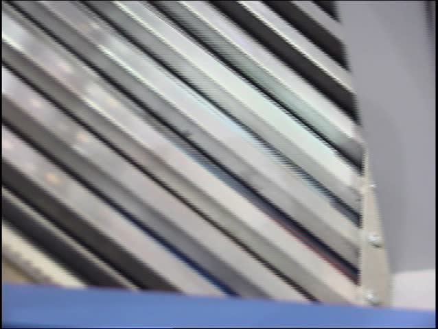 Sequence of three close-ups of a folding process (DVCPRO Quality in PAL format - artifacts are only in web-preview)