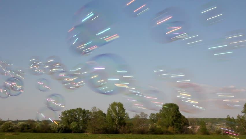 soap bubbles on blue sky background