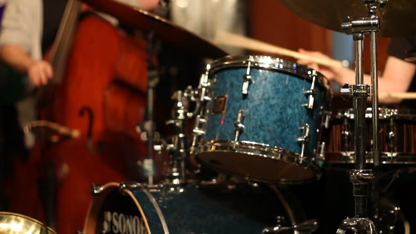 Live musicians play a jazz set.