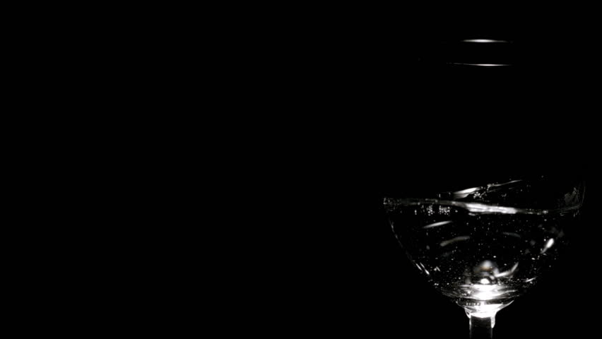 Slow Motion: Water being poured in glass with splashes, bubbles and shaky glass. (165 fps / HD-Highspeed-Camera)