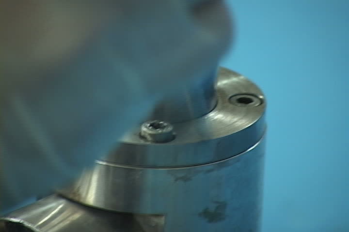 mechanical part of machine (hand work)