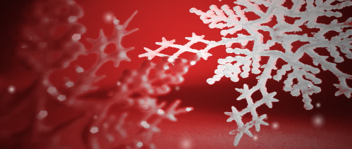 White snowflakes on red background