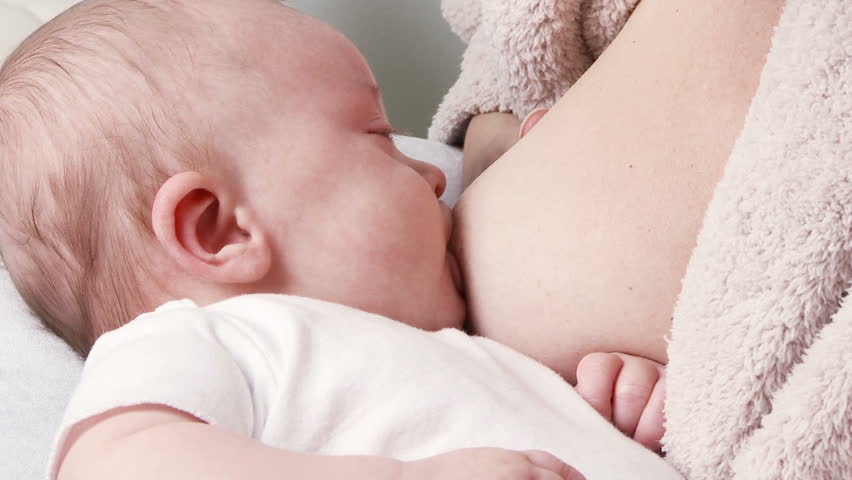 Mother nursing baby